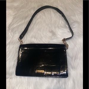 Kate Spade patent handbag with chain handle and bow detail